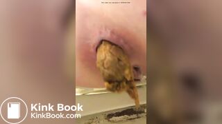 Chick Grunting Out Big Log in Toilet