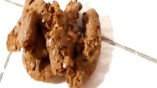 skinny girl does a perfect soft serve shit