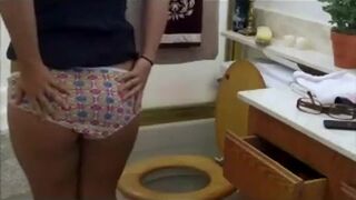 Blonde chick pooping