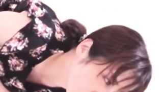 Asian women blowing up toilet