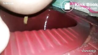Asian girl pooping in toilet - video 2