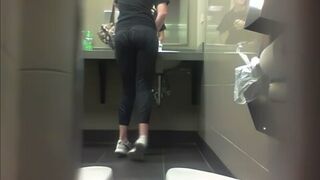 Gym staff with nice ass on the toilet