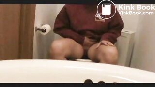 pooping and straining on the pot