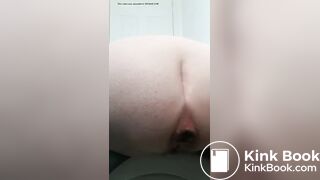 Rear view shit in toilet