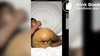 Smearing her ass with shit and tasting it