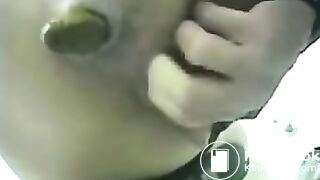 japanese woman fingering her pussy to help her poop