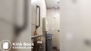 Woman has diarrhea on bathroom wall