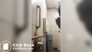 Woman has diarrhea on bathroom wall