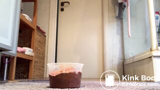 Girl shits into bowl