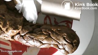 Girl in pink thong shits