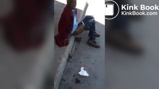 Old and homeless woman pooping in the streets.