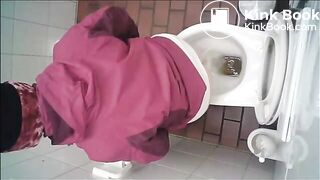 Woman has diarrhea in public toilet in cafe