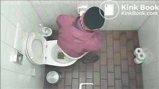 Woman has diarrhea in public toilet in cafe