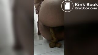Girl pooping on her side