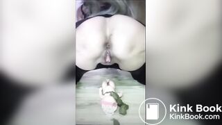 Shitting on a baby doll