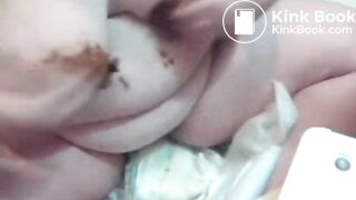 Fat diaper girl plays with poop