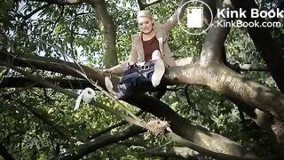Girl pooping on a tree