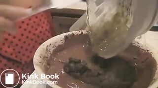 Girl shit and makes brownies with iy