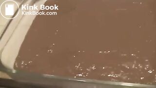 Girl shit and makes brownies with iy