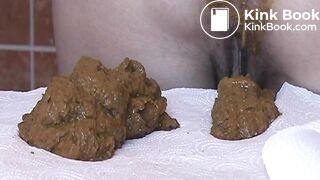Pretty milf poops soft load on table and shows ass