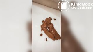 Ebony girl shitting in mirror