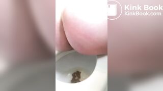 Quick poop on toilet.