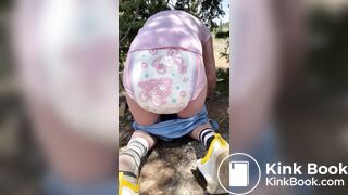 cute girl messing diaper - video 2