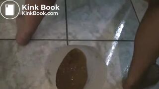 liquid shit in a white bucket