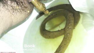 Protracted shit and strong piss in public toilet.