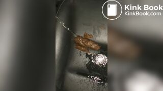 Pissing on her shit