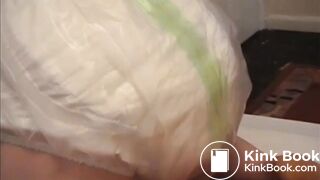 Girl poops diaper and plastic pants 1