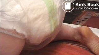 Girl poops diaper and plastic pants 1