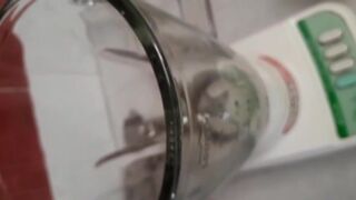 Girl making scat and piss cocktail