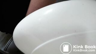 Pooping into white potty