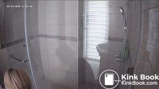 A blonde chick takes a shit in bathroom (mirror)