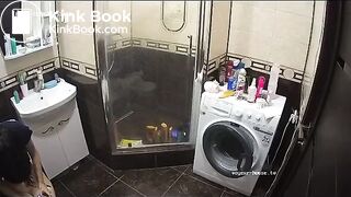 A young chick pooping in bathroom while using phone