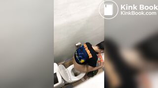 Thai womam pooping in toilet
