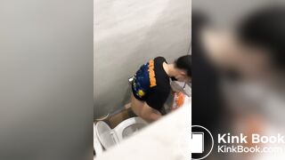 Thai womam pooping in toilet