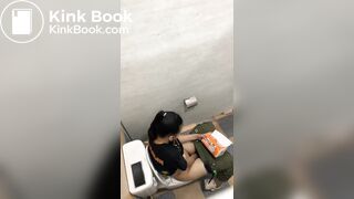 Thai womam pooping in toilet
