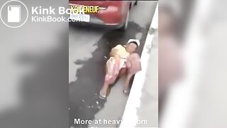 Woman pooping gets knocked over