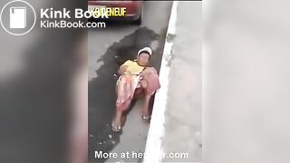 Woman pooping gets knocked over