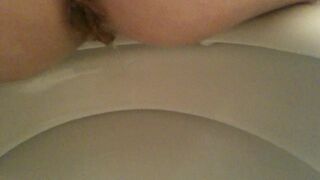 Scat closeup on bowl rear view