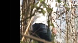 Voyeur spies on girll shitting in tall grass