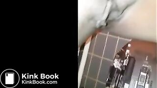 Ebony shitting and pissing over toilet