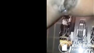 Ebony shitting and pissing over toilet