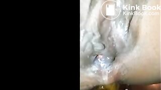 Ebony shitting and pissing over toilet