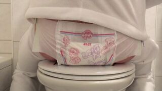 Girl messes pull up diaper multiple times and sits in it - video 2