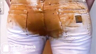 Girl shitting in white jeans