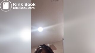 Nasty ebony chick shits in urinal and spits