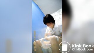 Thai Woman sitting shit in the bathroom
